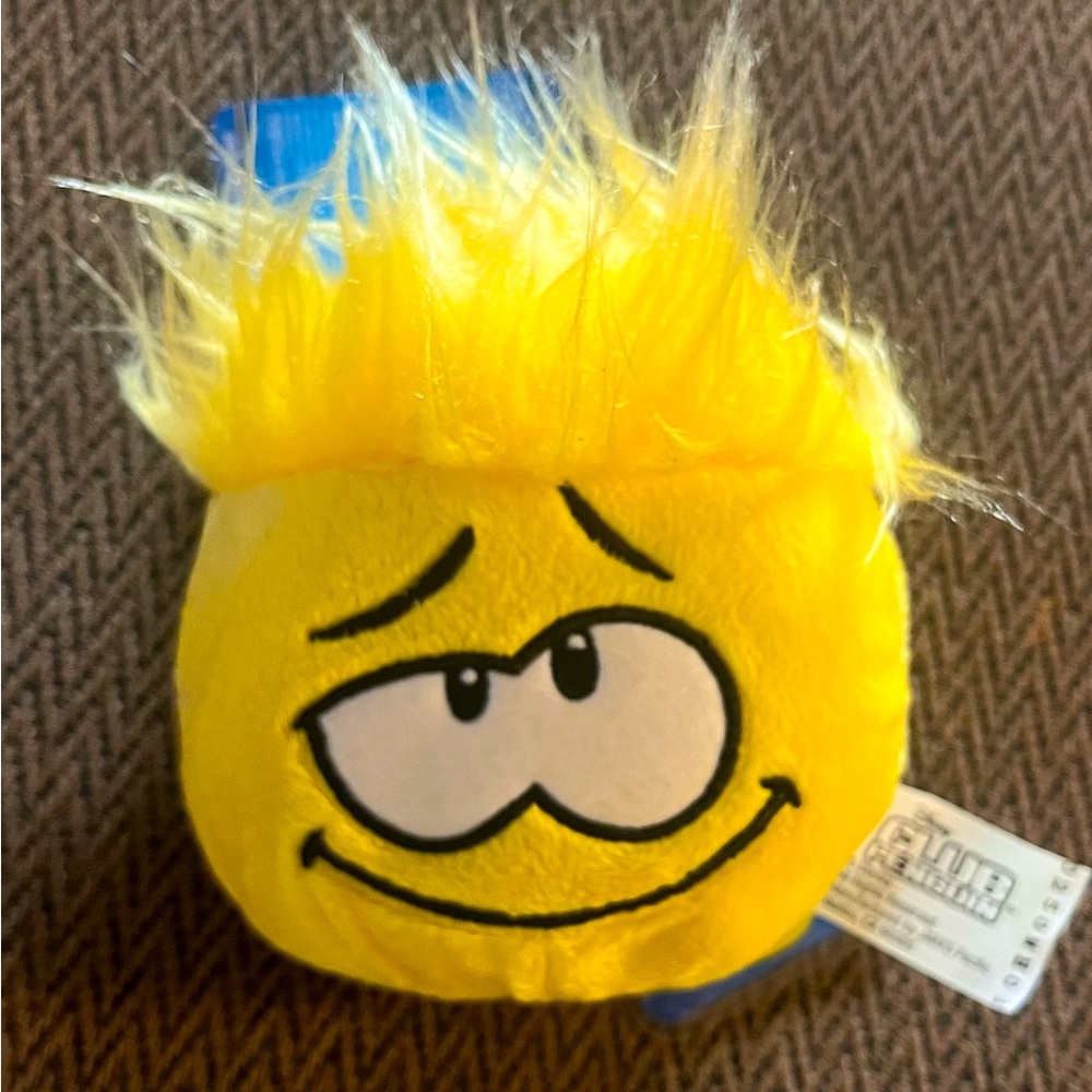 Club Penguin Yellow Puffle Series 4 with Tag and Unused Coin still attached